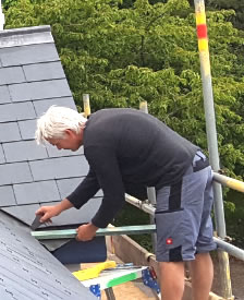 Roofer at work